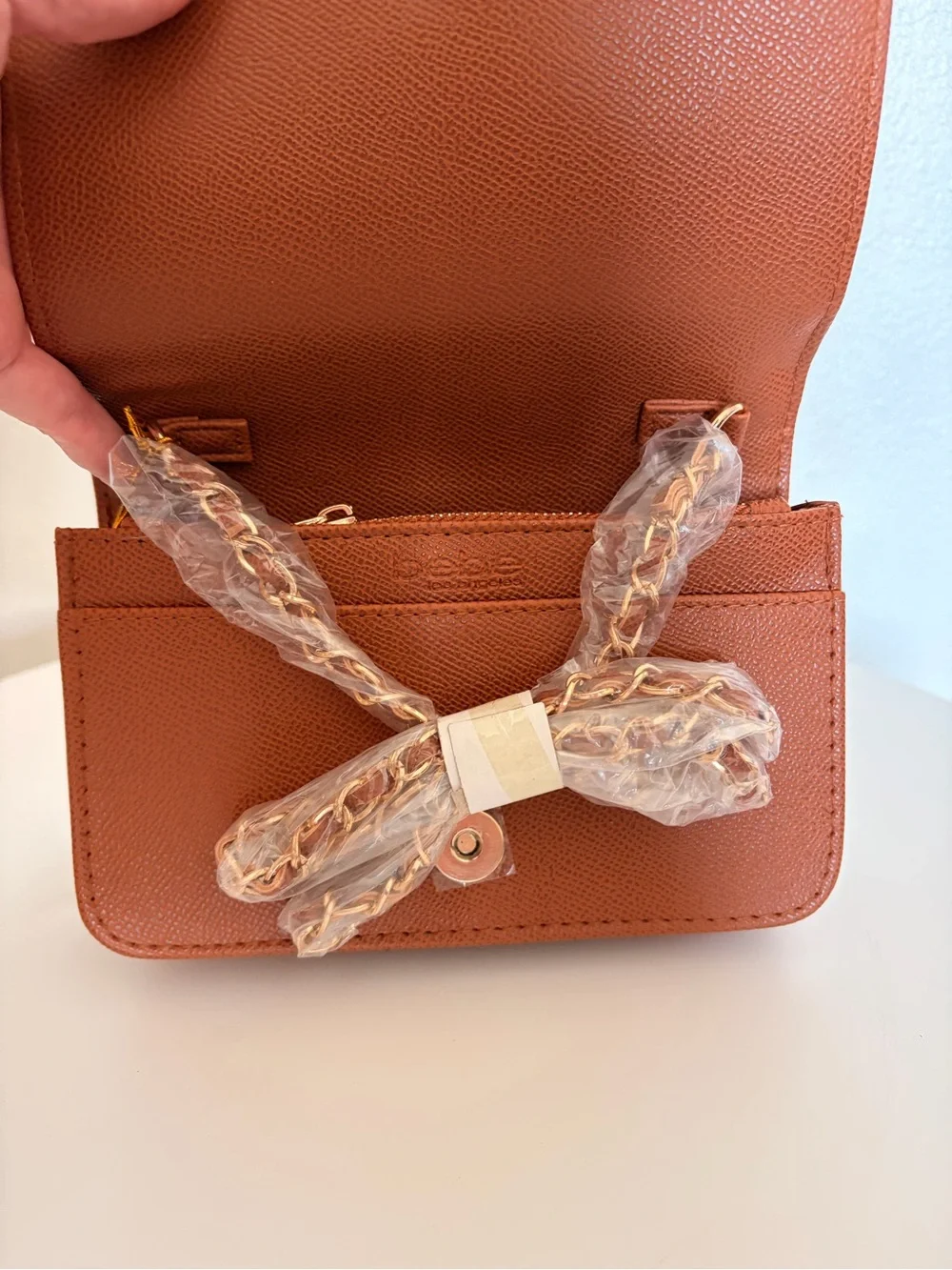 bebe Beige Clutch with Brown and Cream Stripe Accent